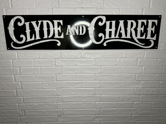 Personalized metal name sign with custom Clyde and Charee design by White Bear Fabrication